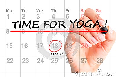 Close-up of â€œ Time for yogaâ€ text on calendar Stock Photo